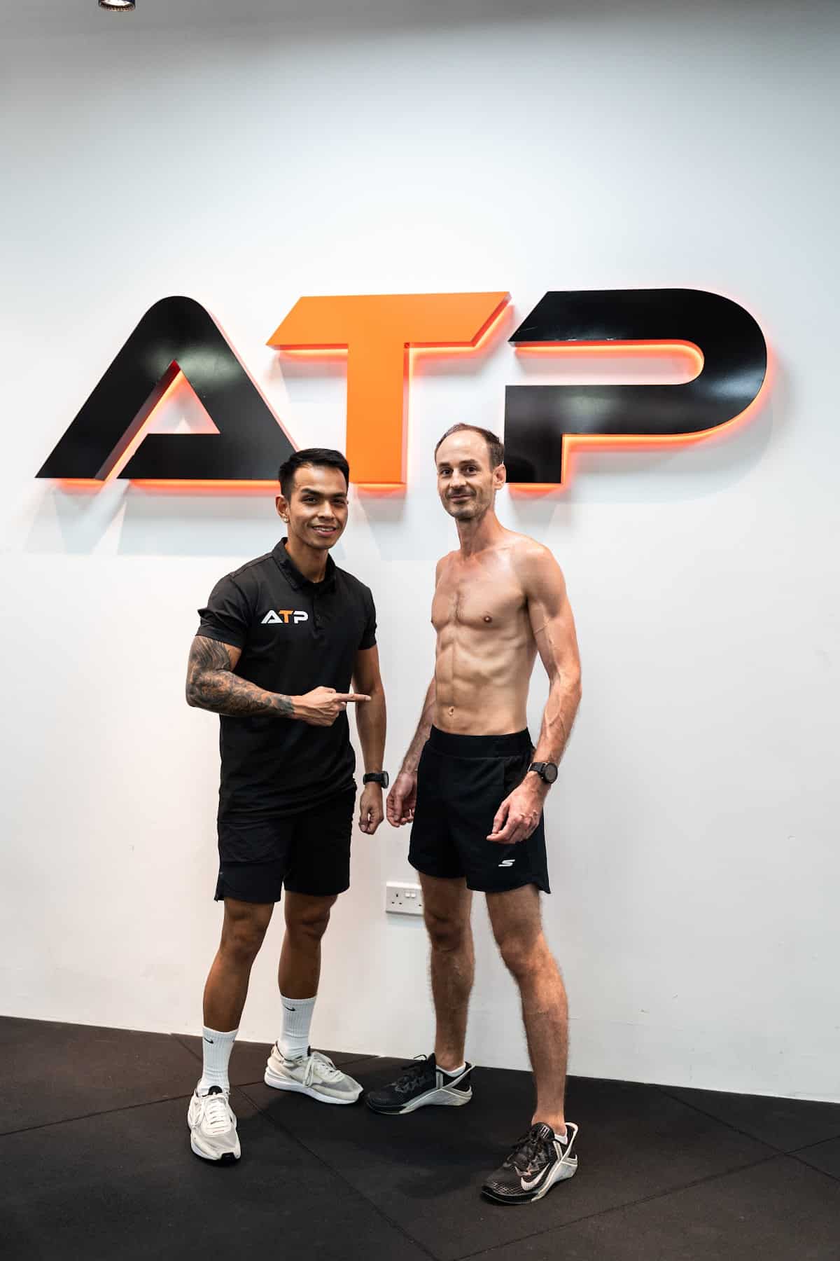 Fabrice with his ATP personal trainer in Singapore