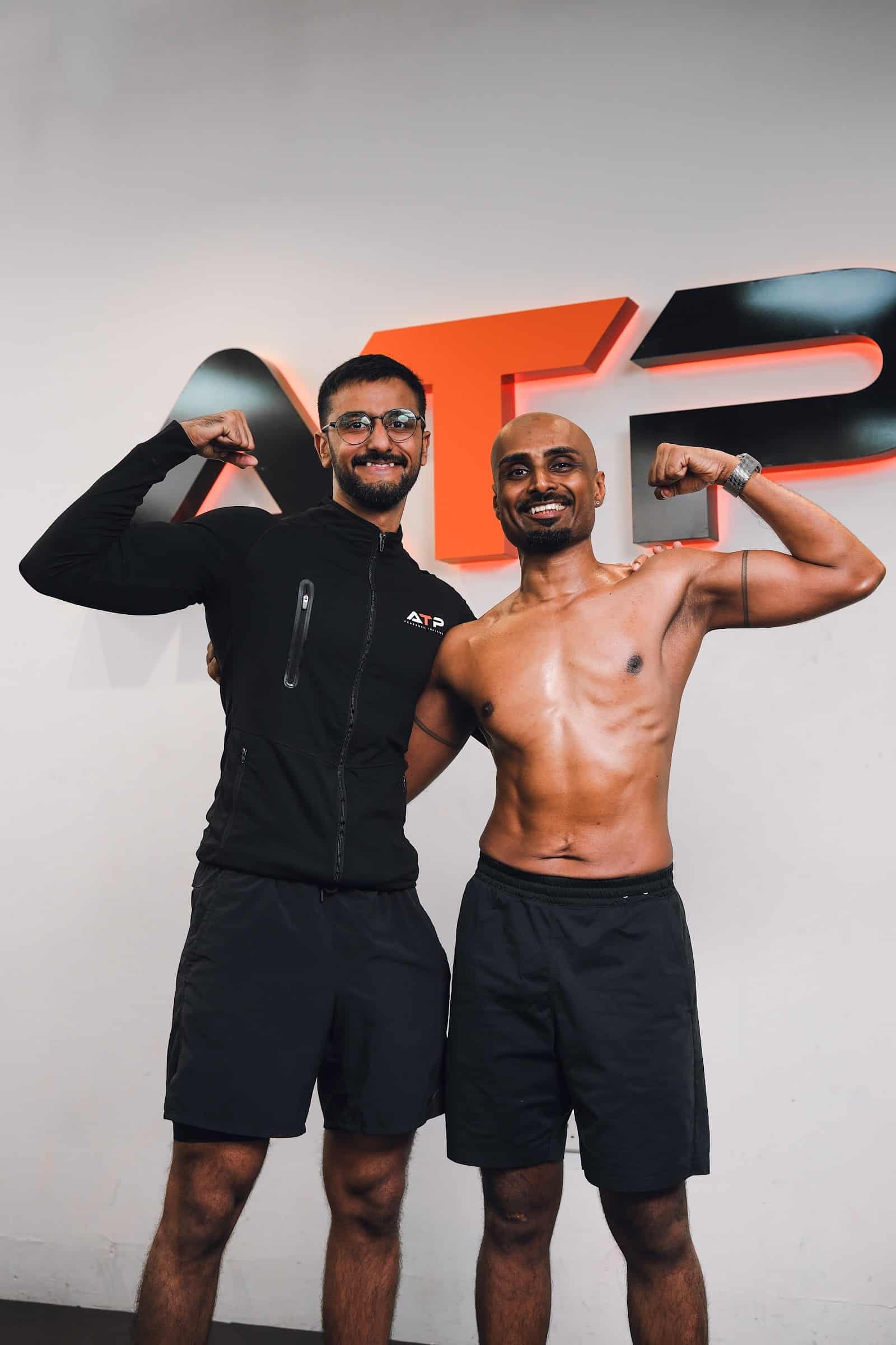 Vilvum with his coach at ATP Personal Training Singapore